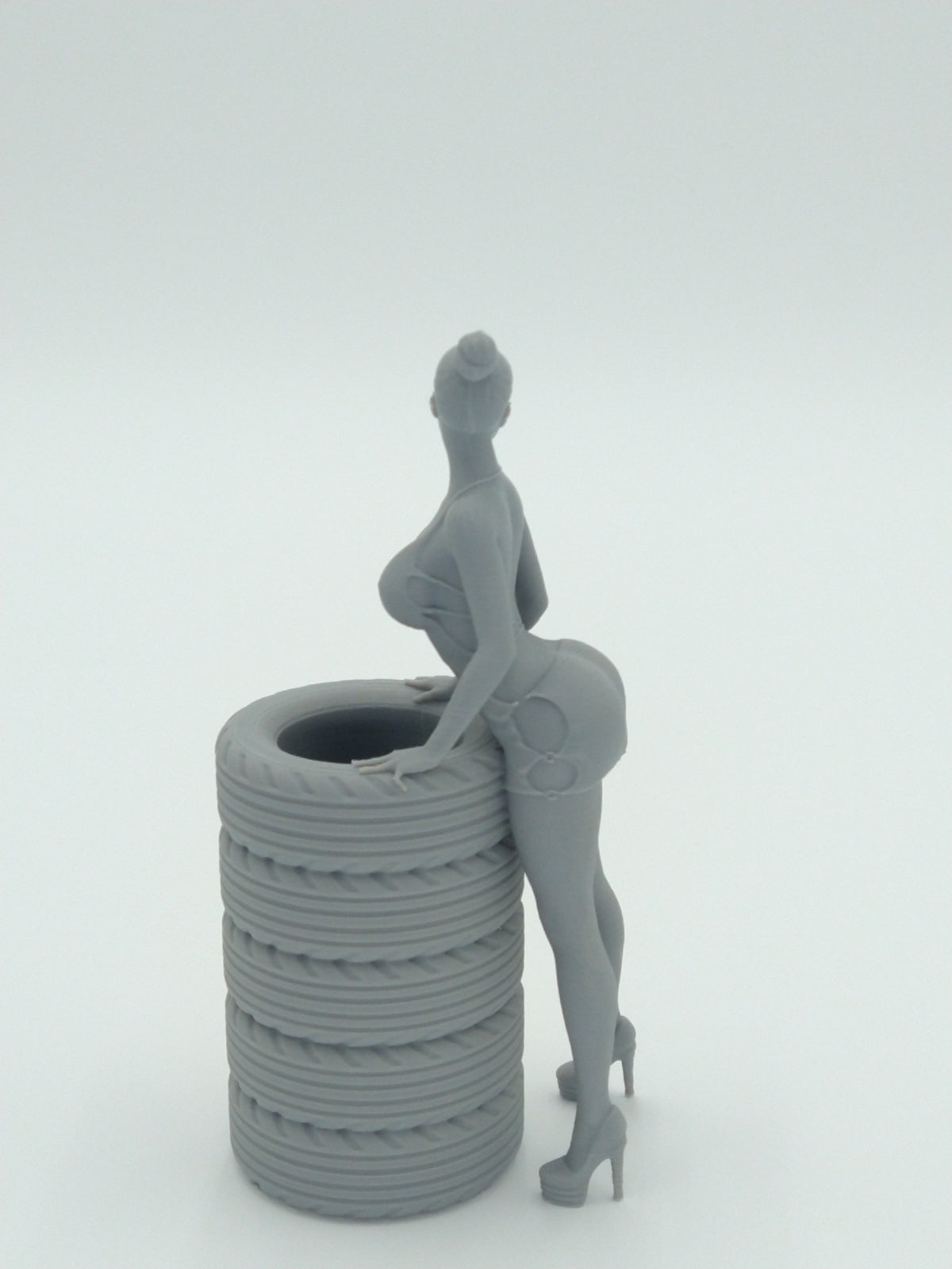 Sexy Bikini Girl Posing on Tires Pen Holder 5.5" Gray 3d printed