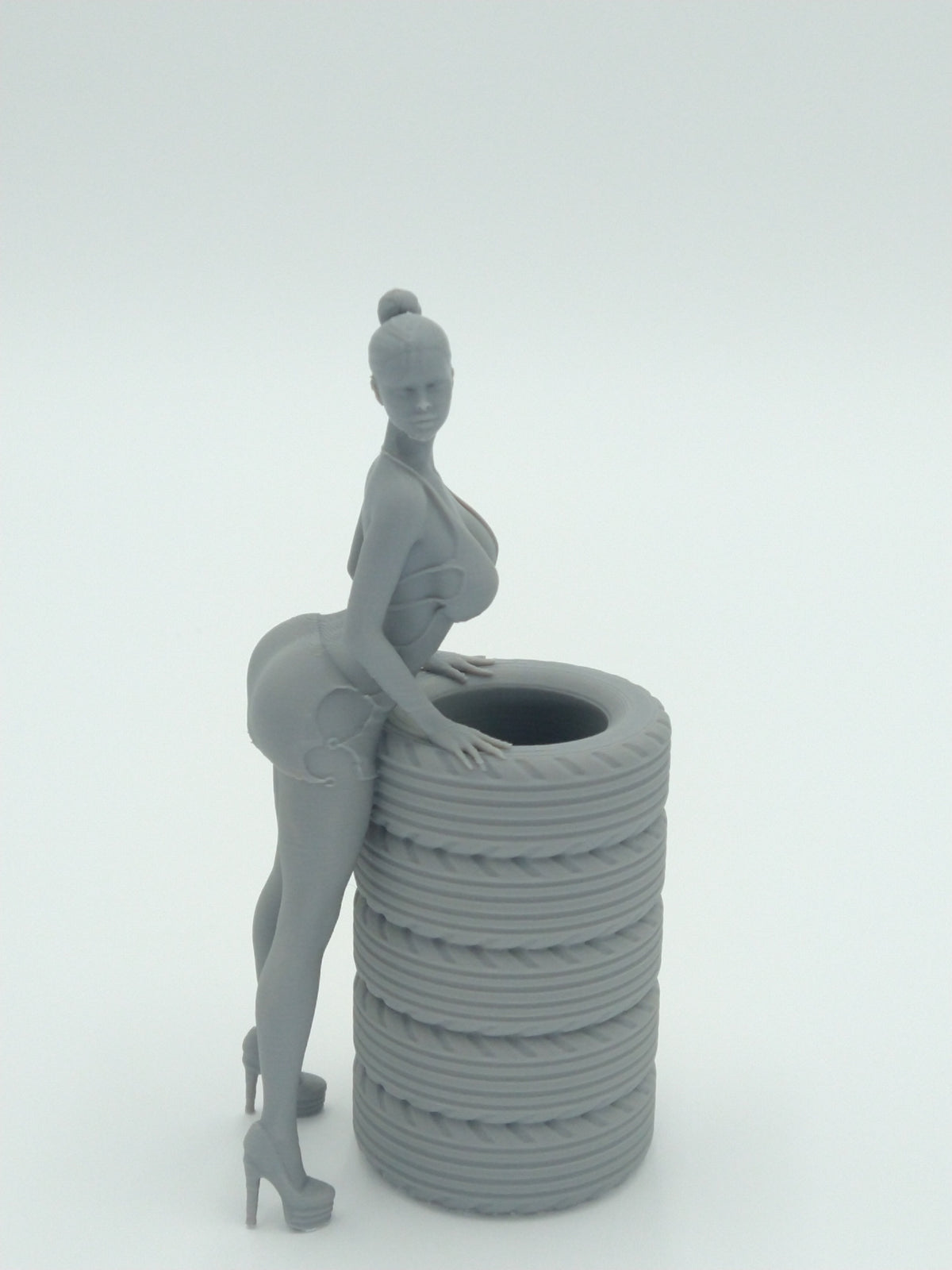 Sexy Bikini Girl Posing on Tires Pen Holder 5.5" Gray 3d printed